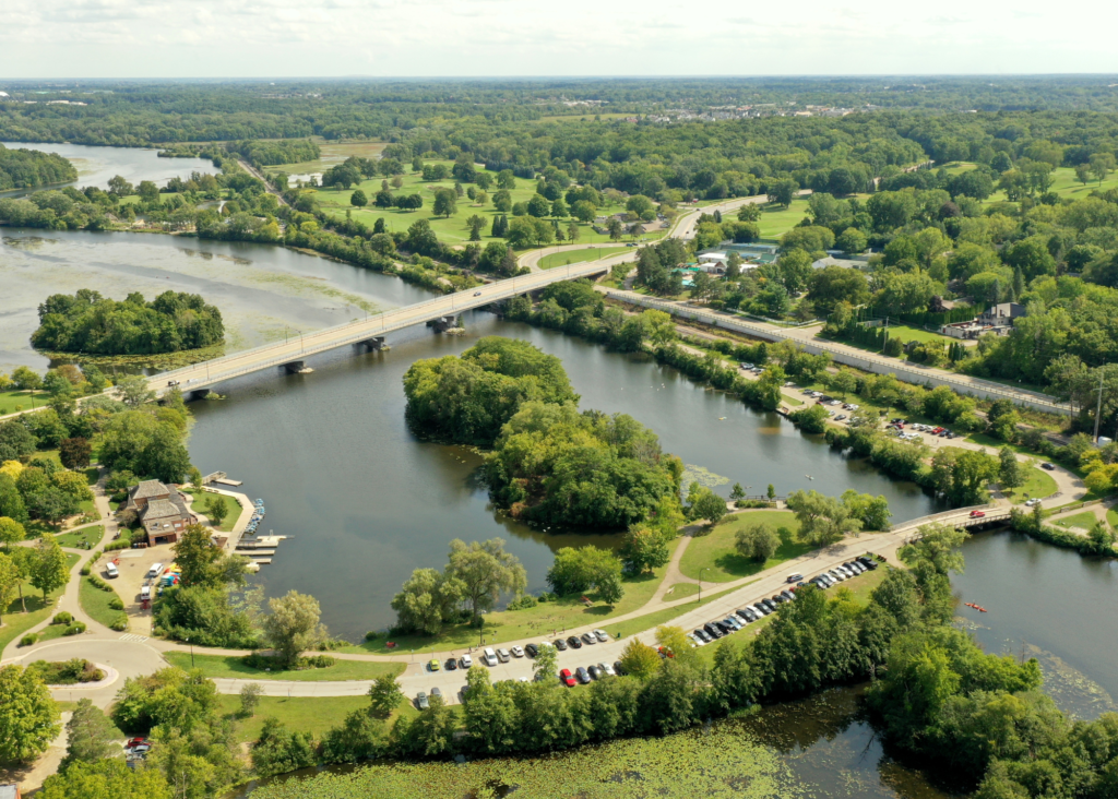 Aerial view of a river and neighborhood in Michigan